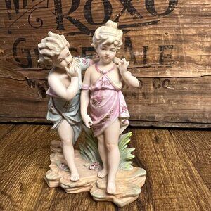 Vintage Bisque Porcelain Figurine Of Two Children In Pastel Outfits